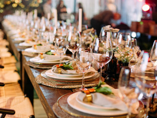Natural stone bowls and plates styled for hospitality dining