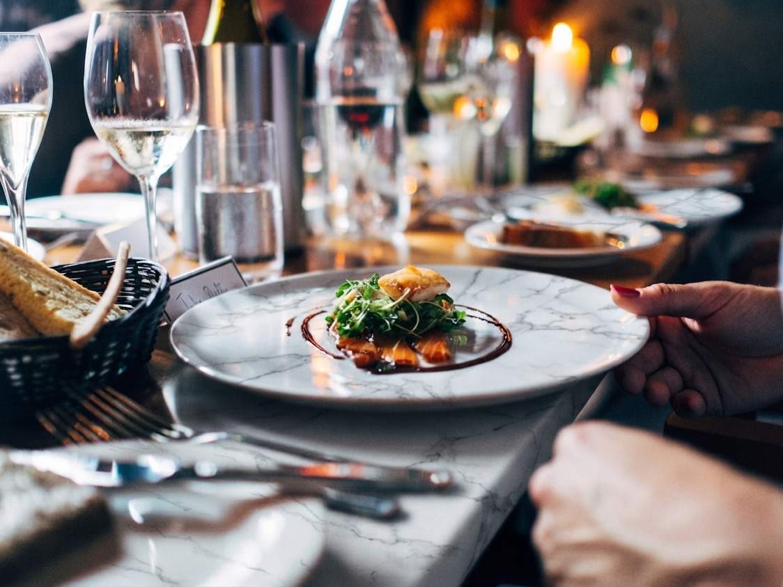 Restaurant table set with natural stone bowls and plates